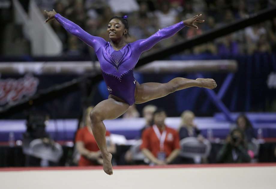 Simone Biles three-time defending world champion gymnast competes on the floor exercise during the trials in San Jose