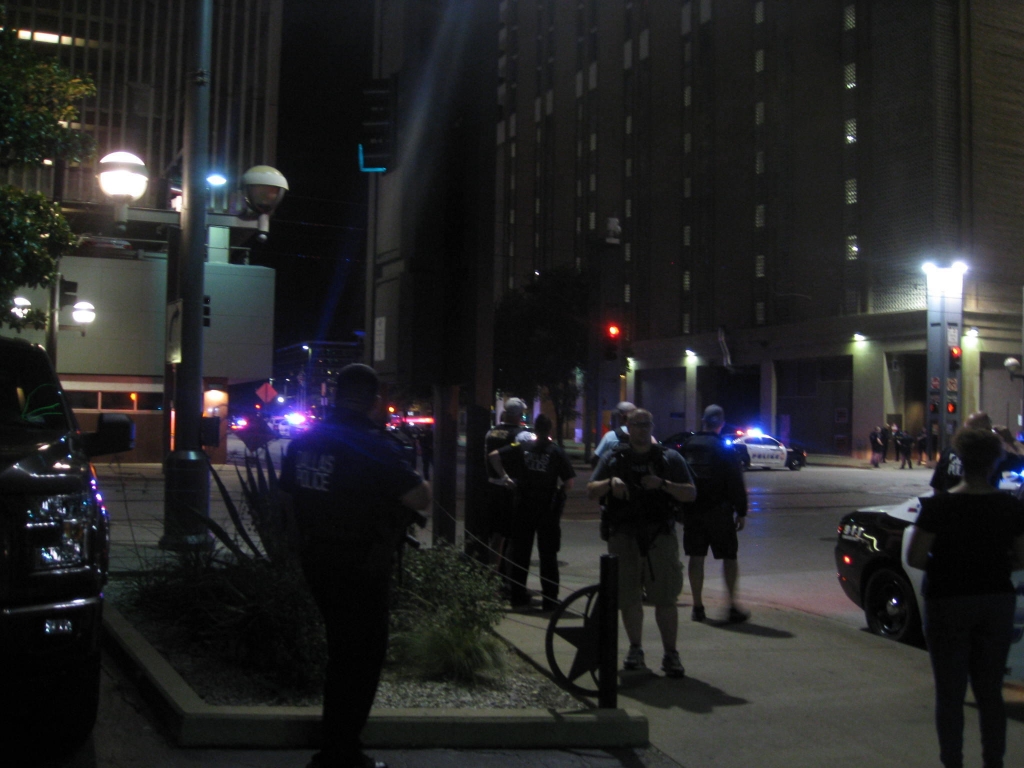 Police flooded downtown Dallas following a shooting that left at least four officers dead