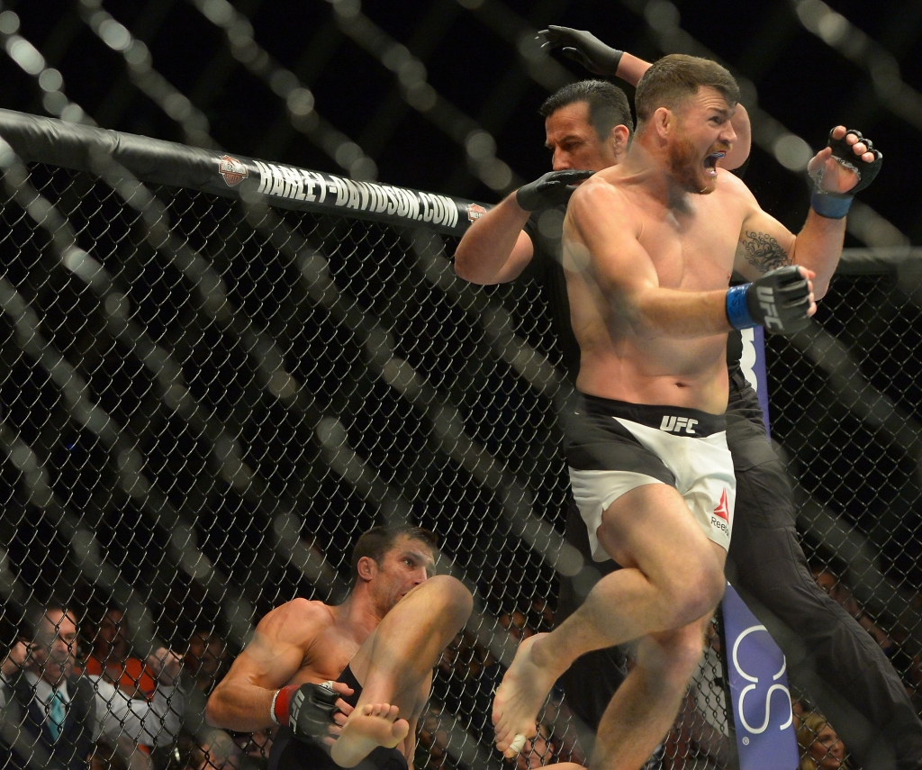 Bisping wheels away in celebration after destroying Rockhold inside a round