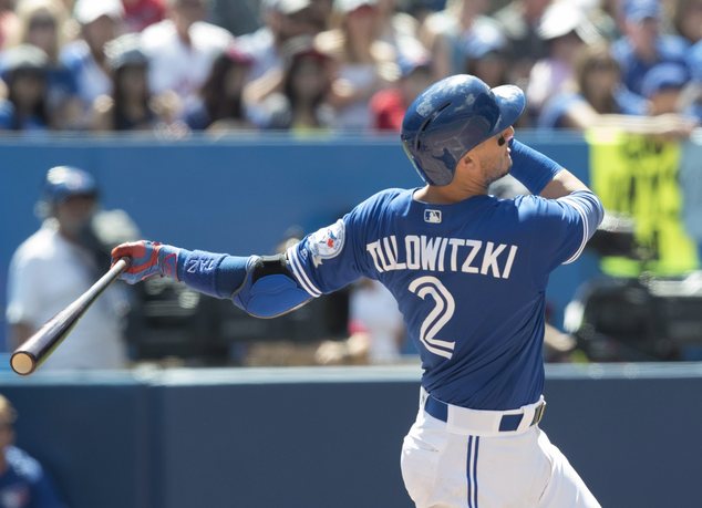 Toronto Blue Jays Troy Tulowitzki hits a three-run home run against the Cleveland Indians during sixth inning American League MLB baseball action in Toronto