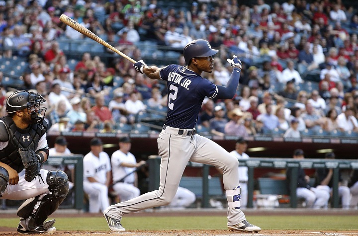 San Diego Padres&#039 Melvin Upton Jr. watches his RBI single in front of Arizona Diamondbacks&#039 Welington Castillo watches during the first inning of a baseball game Friday