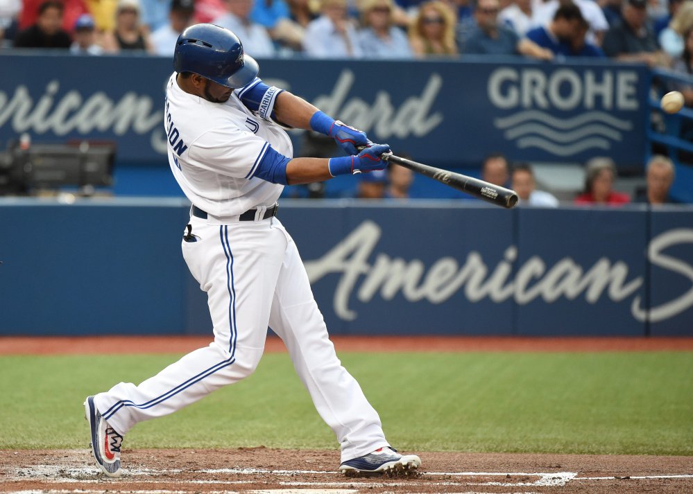 Toronto's Edwin Encarnacion homers during the Blue Jays three-home run first inning Friday night against the Orioles. Toronto won 6-5 at home