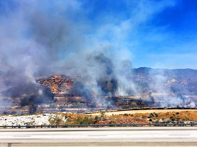 California wildfires: Hundreds flee Los Angeles homes