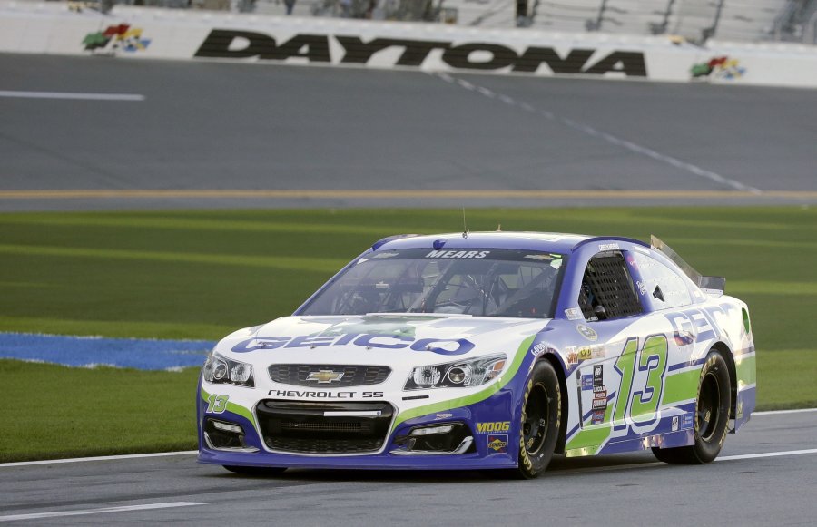 Casey Mears drives down pit road before going out on the track during a practice session for the NASCAR Sprint Unlimited auto race at Daytona International Speedway Friday Feb. 12 2016 in Daytona Beach Fla