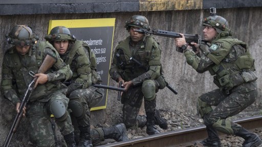 Brazilian army special forces assigned to the security of the Rio 2016 Olympics Games train along the platforms of the Deodoro train station in Rio de Janeiro Brazil