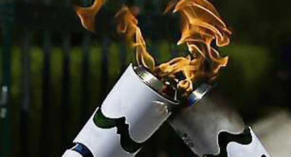 Olympic torch bearer attacked by man with fire extinguisher (VIDEO)