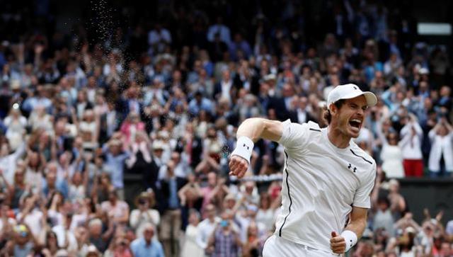 Britain's Andy Murray celebrates winning the men's singles final against Canada's Milos Raonic