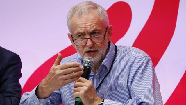 British Labour leader Jeremy Corbyn speaks during a conference in Paris on Friday