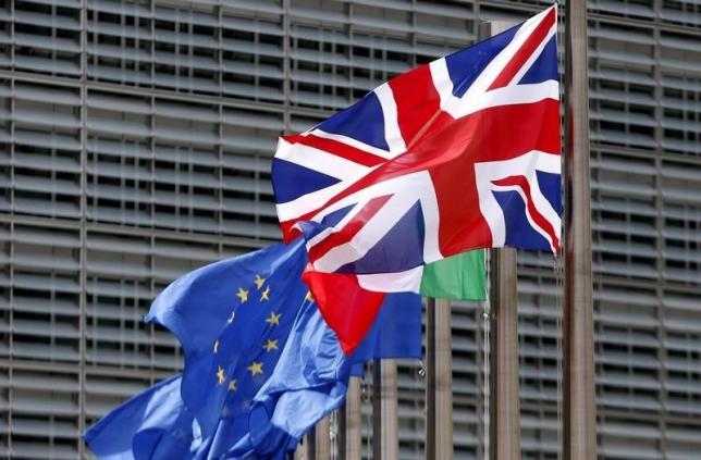 British flag and European Union flags flutter outside the EU Commission headquarters in Brussels Belgium