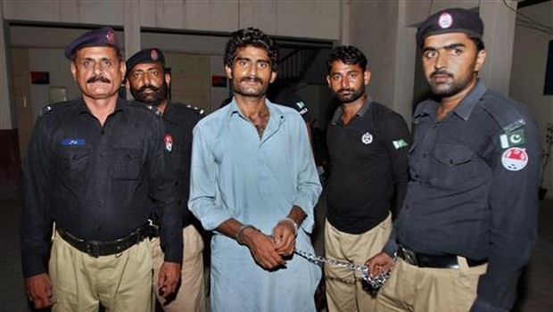 Pakistani police officers present Waseem Azeem the brother of slain model Qandeel Baloch before the media following his arrest at a police station in Multan Pakistan. | AP