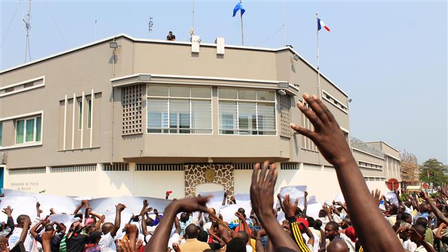 Protesters in Bujumbura demonstrate in front of France's embassy against a United Nations Security Council decision to send a police contingent to Burundi following France's drafting of the UN resolution to send the controversial police squad Ju