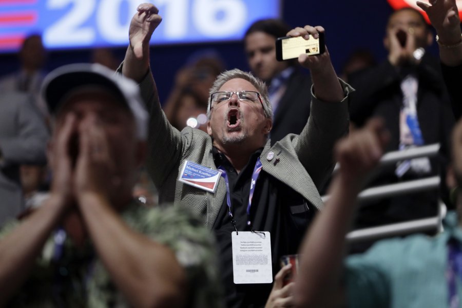 ASSOCIATED PRESS Delegates react to Sen. Ted Cruz R-Texas as he addresses the audience during the third-day session of the Republican National Convention in Cleveland on Wednesday