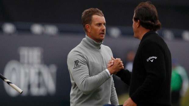 Henrik Stenson left and Phil Mickelson are set to battle it out in the final round of the British Open