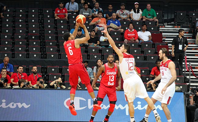 DAVAO. Canada's Cory Joseph of the Toronto Raptors shoots a buzzer beating jump shot at the end of the third quarter during their Fiba Olympic Qualifying Tournament Group A game against Turkey at the Mall of Asia Arena in Pasay City Tuesday evenin