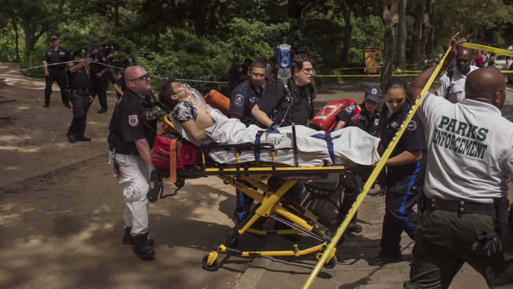 Connor Golden is wheeled to an ambulance after he was severely injured in Central Park by stepping on explosive material on Sunday