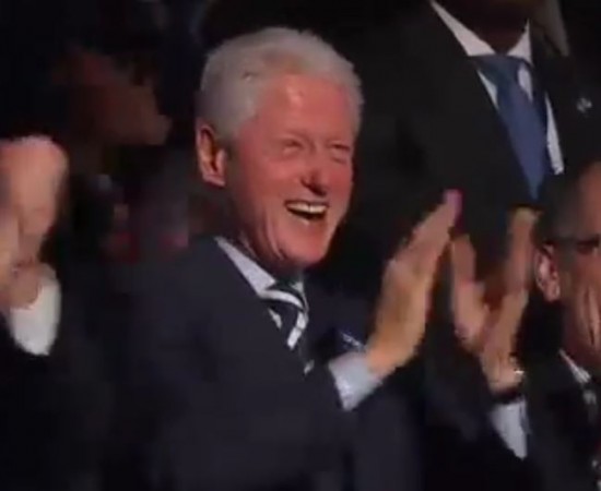 Bill Clinton applauds