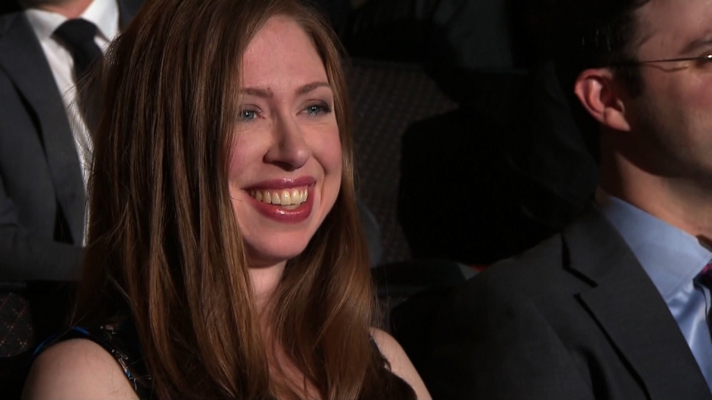 Chelsea Clinton watches her father former President Bill Clinton speak at the Democratic National Convention in Philadelphia