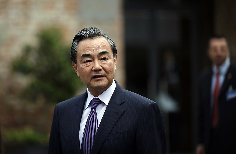 Chinese Foreign Minister Wang Yi speaks to the press after the meetings in Vientiane capital of Laos