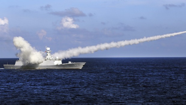 Chinese missile frigate Yuncheng launches an anti-ship missile during a military exercise in the waters in the South