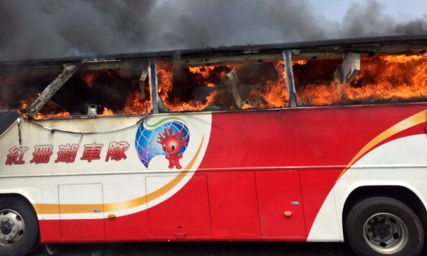 Taiwan bus crash: dozens of tourists reported killed after vehicle catches fire