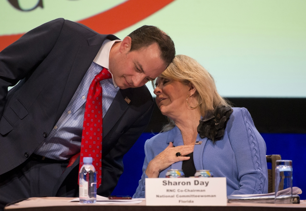 Reince Priebus chairman of the Republican National Committee left speaks with co-chair Sharon Day during an RNC meeting earlier this year. AP  Wilfredo Lee