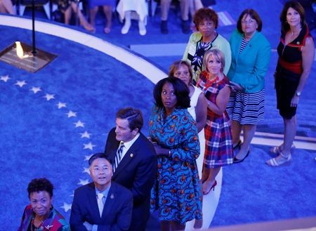 Congressional candidates that are running for office watch a video while standing onstage at the Democratic National Convention in Philadelphia Pennsylvania