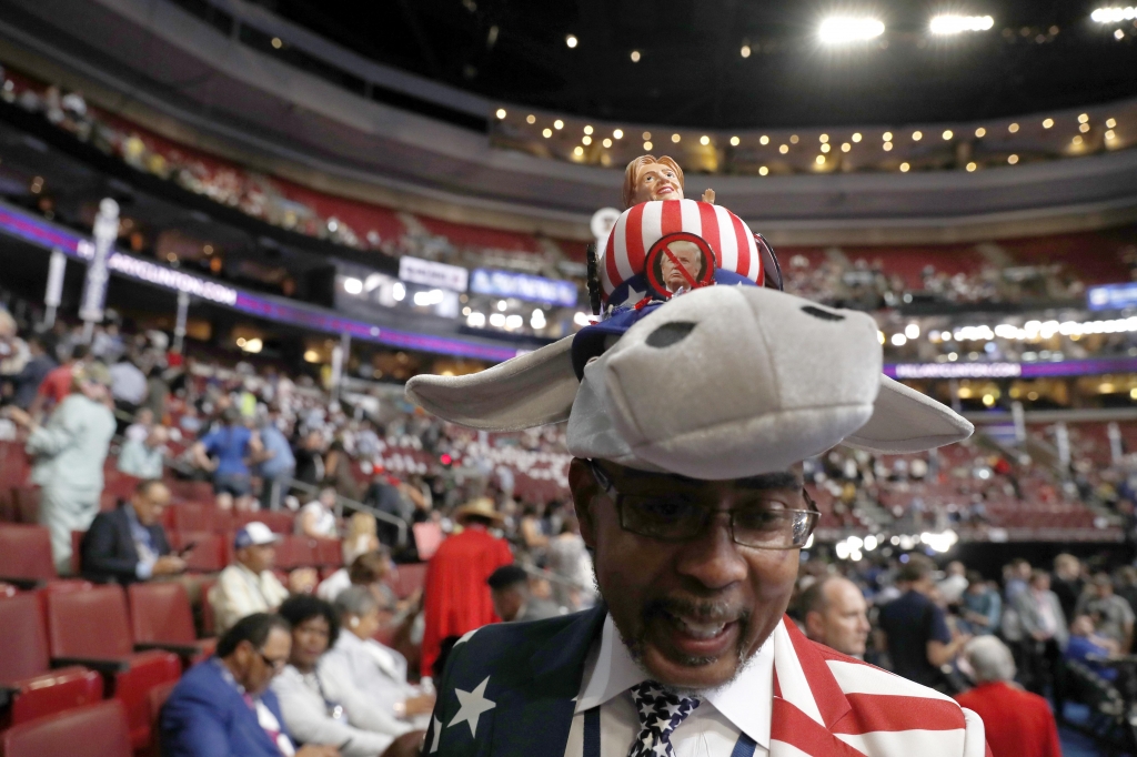 Delegate Rodney Mc Farland from Monroe La. walks around before before the start of the third day session of the Democratic National Convention in Philadelphia Wednesday