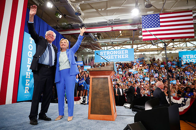 Hillary Clinton and Sen. Bernie Sanders during a campaign event at Portsmouth High School in Portsmouth N.H