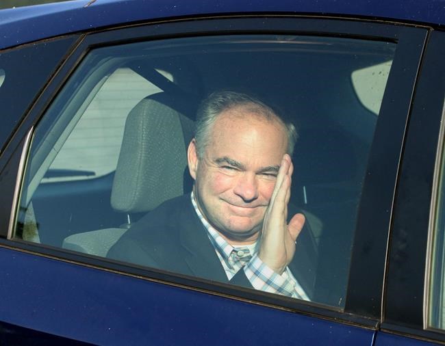 Virginia Senator Tim Kaine a leading contender to be Democratic presidential candidate Hillary Clinton's pick for vice president waves to the crowd before attending a private fundraiser event in Newport RI hosted by fellow Democratic Senator Jack R