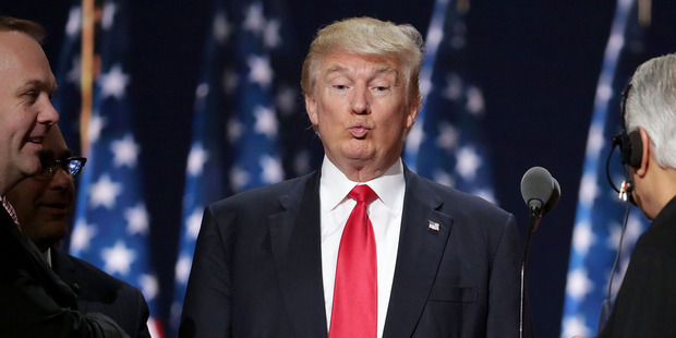 Republican presidential candidate Donald Trump tests the teleprompters and microphones on stage before the start of the fourth day of the Republican National Convention