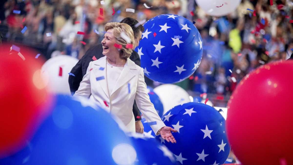 Democratic presidential candidate Hillary Clinton reacts to confetti and balloons as she stands on stage during the final day of the Democratic National Convention in Philadelphia Thursday