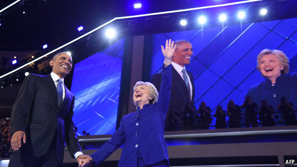 Barack Obama passes the baton to Hillary Clinton