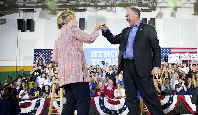 Democratic presidential candidate Hillary Clinton fist bumps Sen. Tim Kaine D-Va. after speaking at a rally at Northern Virginia Community College in Annandale Thursday