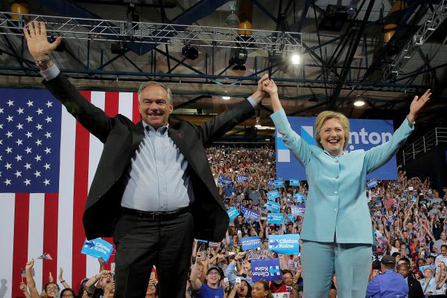 U.S. Democratic presidential candidate Hillary Clinton and Democratic vice presidential candidate Senator Tim Kaine take the stage at a campaign rally in Miami Florida