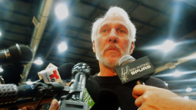 Coach Gregg Popovich talks with reporters about Tim Duncan's retirement