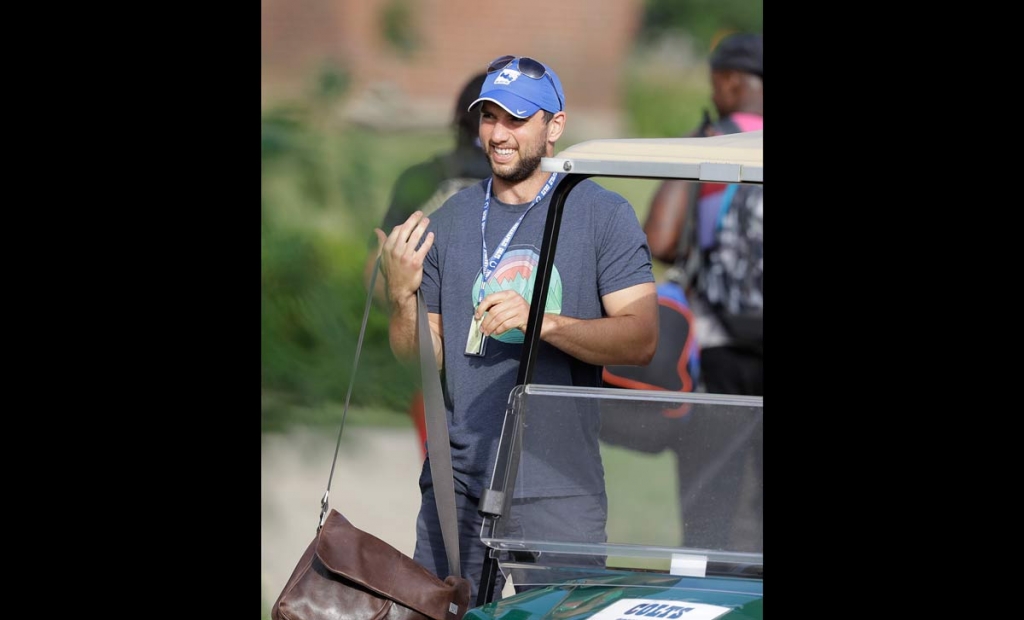 Indianapolis Colts quarterback Andrew Luck arrives for an NFL football training camp Tuesday