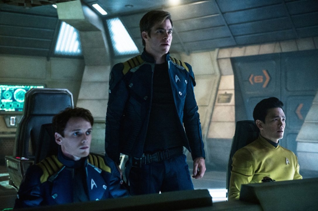 Chris Pine centre reprising his role as Captain Kirk in Star Trek Beyond called late co-star Anton Yelchin left'a wonderful wonderful force of nature and said it was high time they franchise get a gay character in Sulu right played by John Cho