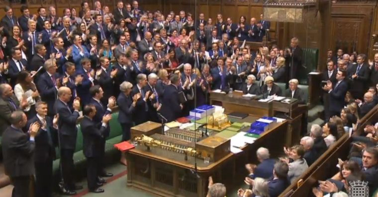 Conservative MPs give Prime Minister David Cameron a standing ovation after finishing his last Prime Minister's Questions