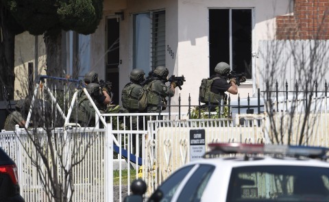 2 San Diego police officers shot, 1 person in custody