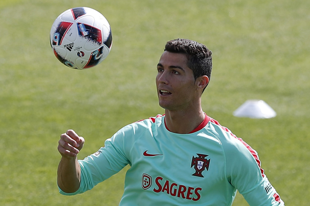 Portugal's Cristiano Ronaldo controls the ball during a training session in preparation of the Euro 2016 final soccer match between France and Portugal