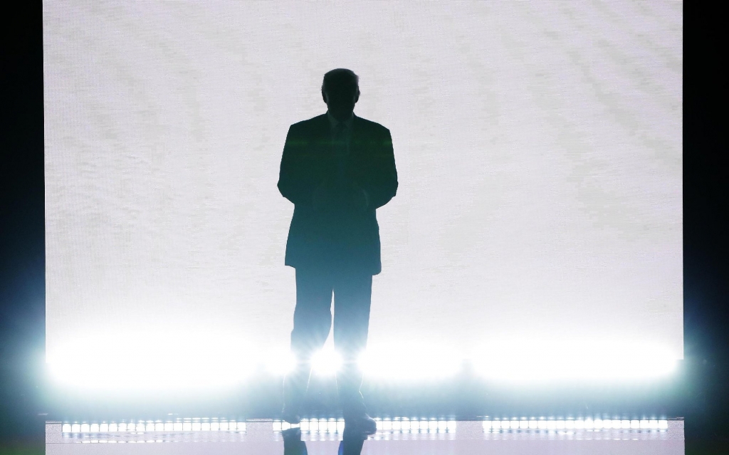 Then-presumptive Republican presidential nominee Donald Trump enters the stage to introduce his wife Melania on the first day of the Republican National Convention