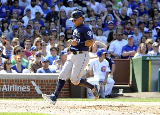 Martin's 2-run double off Chapman leads M's over Cubs 4-1