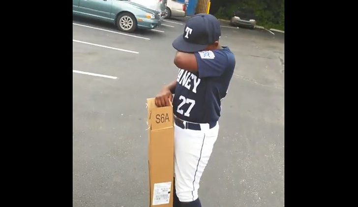 Father surprises Taney player with bat for birthday