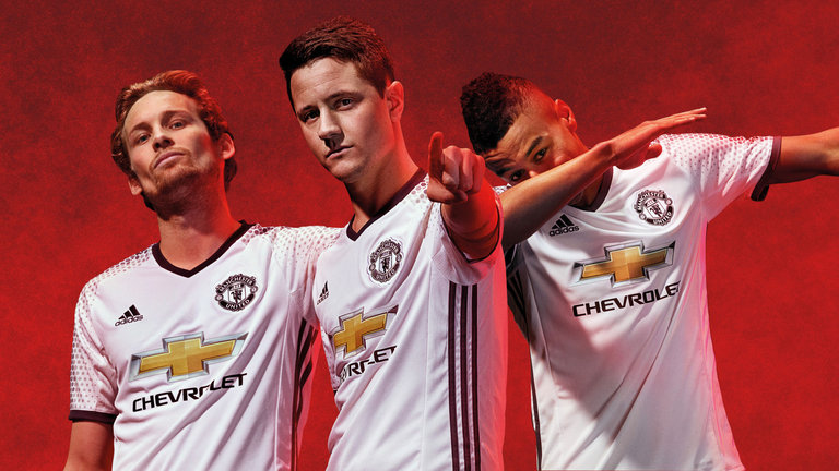 Daley Blind Ander Herrera and Jesse Lingard model the new Manchester United third kit