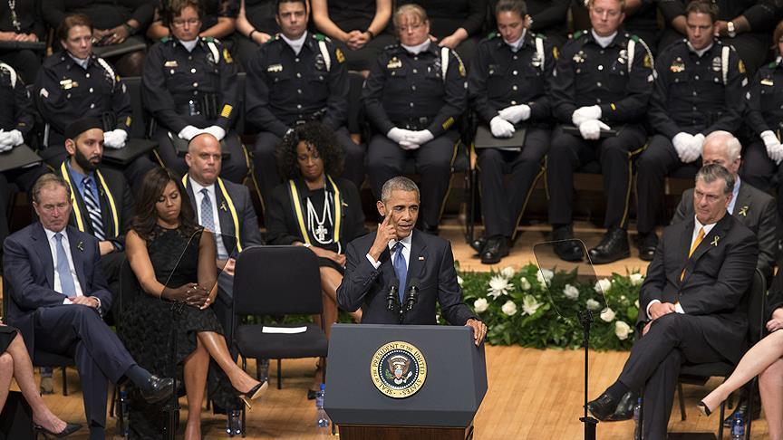 Obama pays respects to slain officers urges unity