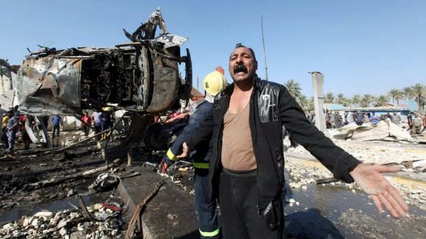 Iraq officials: Suicide car bomb kills 8 in Baghdad district