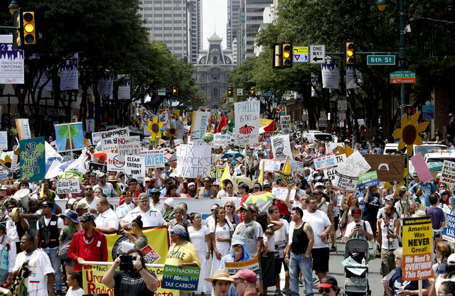 ASSOCIATED PRESS           Protesters march during a demonstration in downtown on Sunday