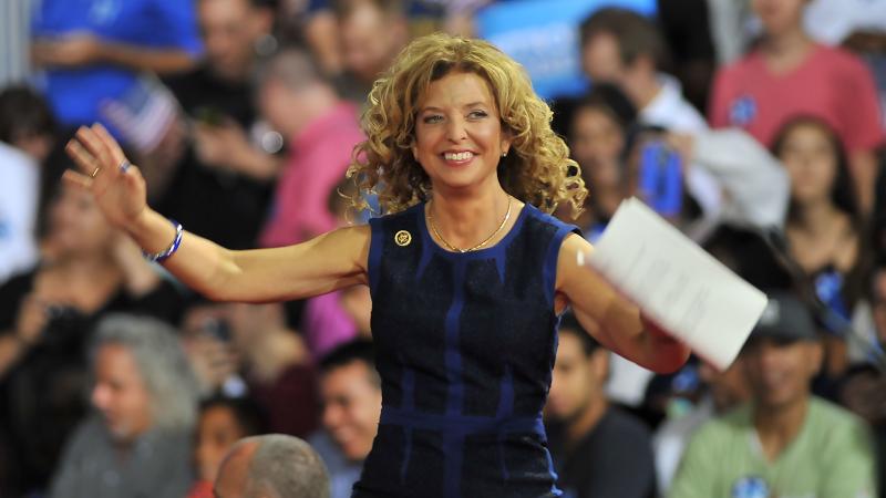 Soon-to-be-former Democratic National Committee Chair Debbie Wasserman Schultz of Florida arrives onstage during a campaign rally for Hillary Clinton and Tim Kaine in Miami on Saturday