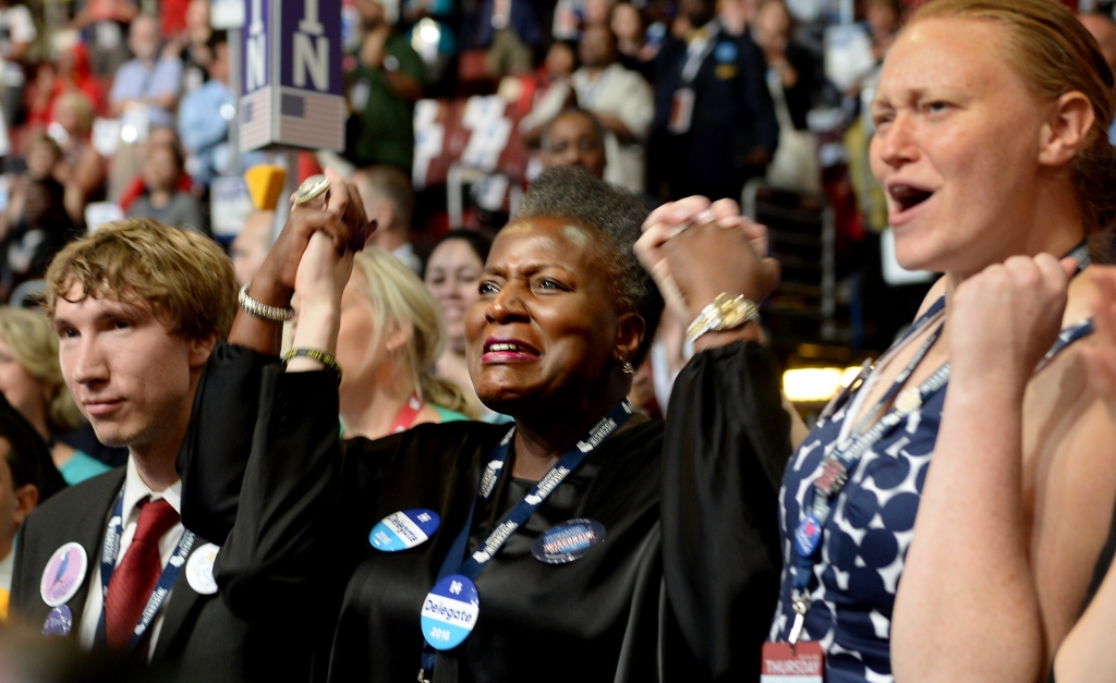 Delegates listen to the National Anthem on the final day of the Democratic National Convention Thursday at the Wells Fargo Center in Philadelphia