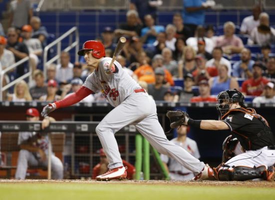 St. Louis Cardinals Aledmys Diaz watches his RBI